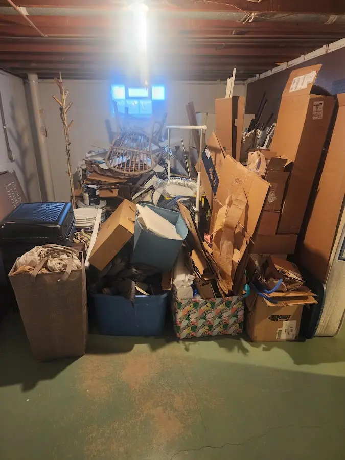 Roll-off dumpster container at job site for Roll Off Dumpster Rental in Wright